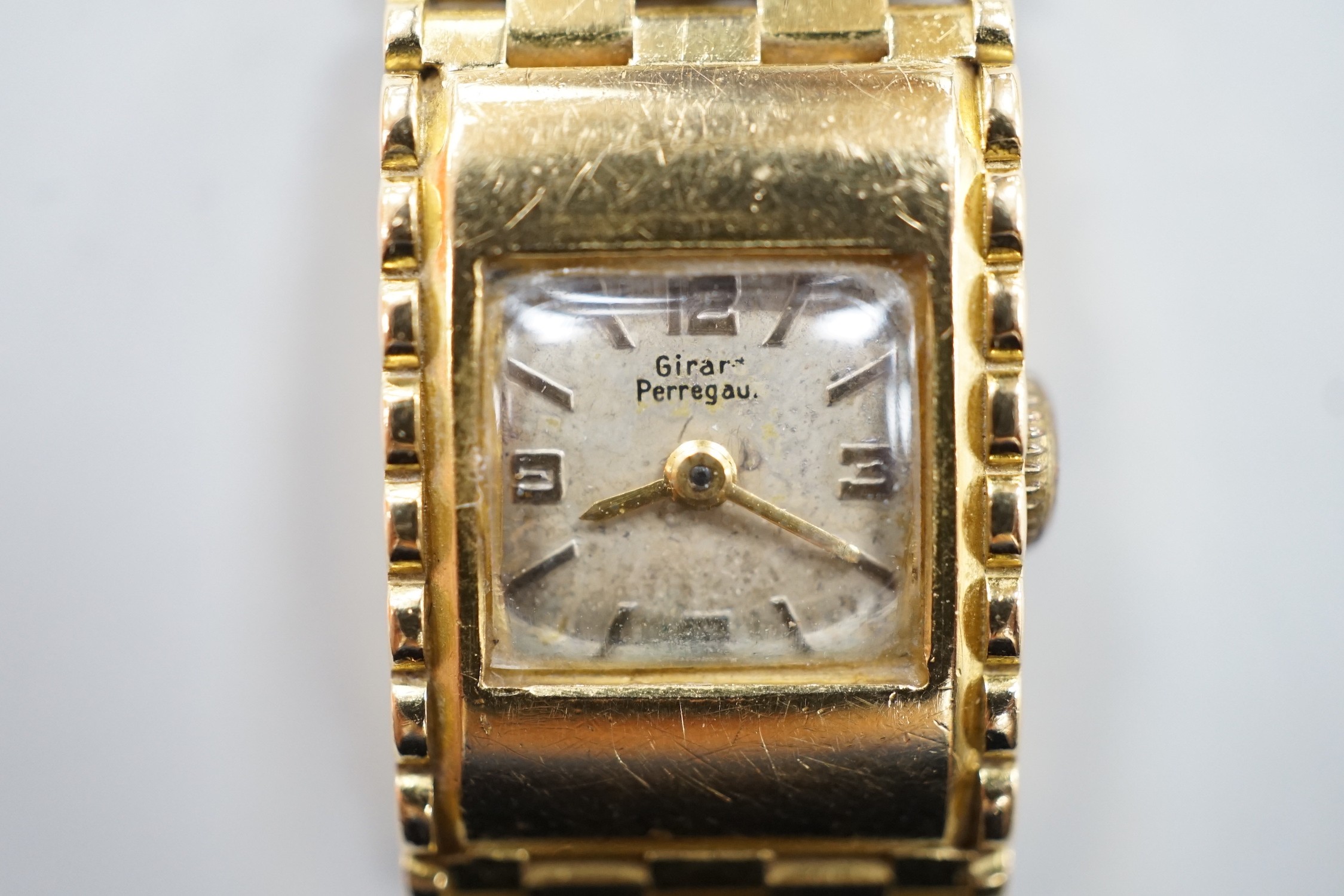 A lady's 18ct gold Girard Perregaux manual wind bracelet watch, overall 17.5cm, gross weight 44.6 grams.